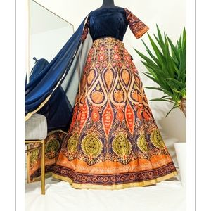 Long silk lehenga with blue velvet house